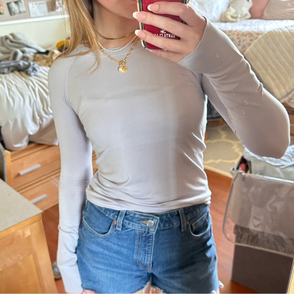 Light purple lululemon swiftly tech long sleeve